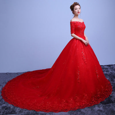 Red trailing one-shoulder wedding dress