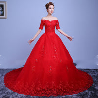 Red trailing one-shoulder wedding dress