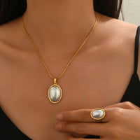 Lxalry Golden Jewelry Set – Oval Necklace & Ring Combo with Polished Finish